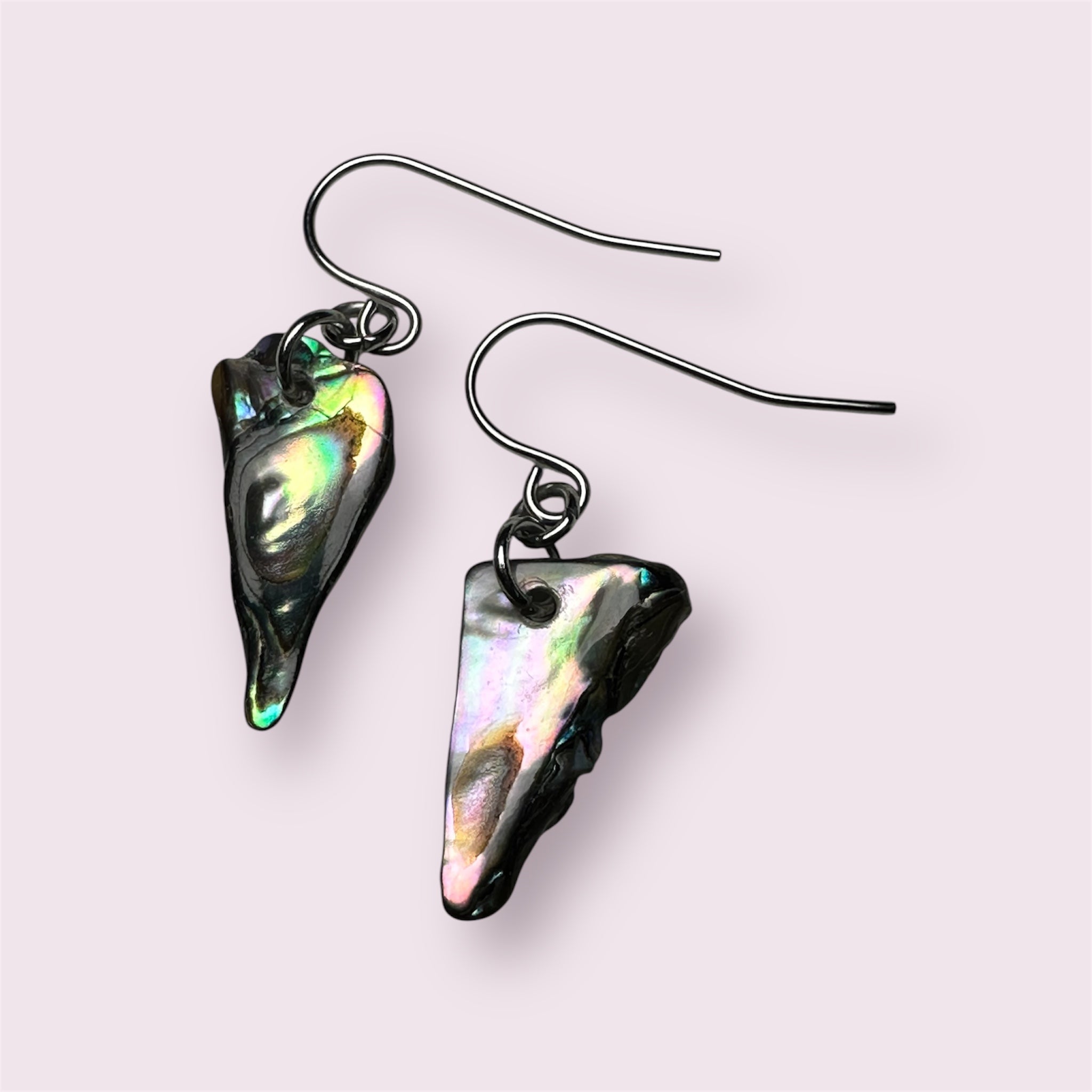 Ocean-inspired earrings made with Paua shell and stainless steel