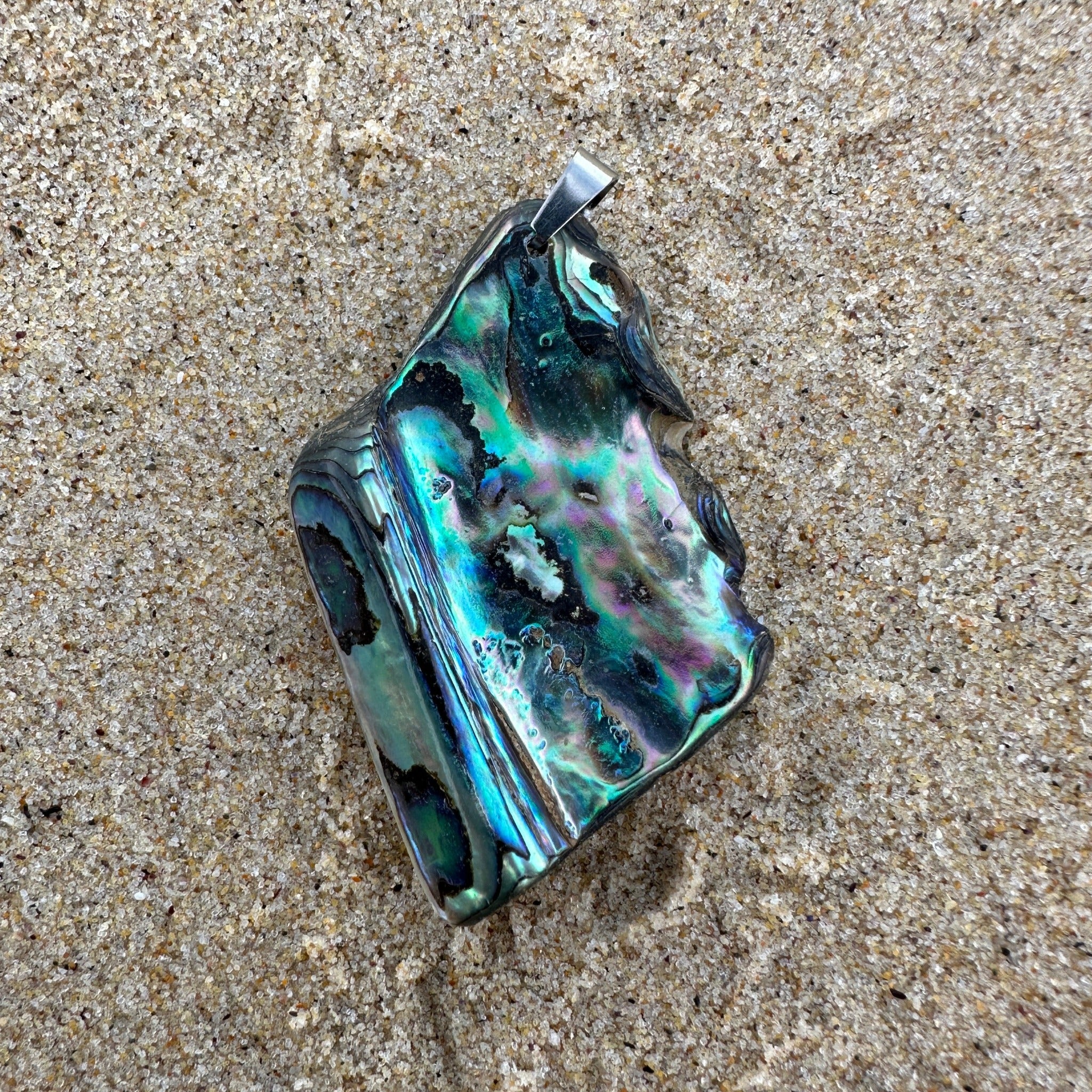 Large Paua Shell Pendant with iridescent natural colours, paired with a complimentary stainless steel chain. 10177_LGE