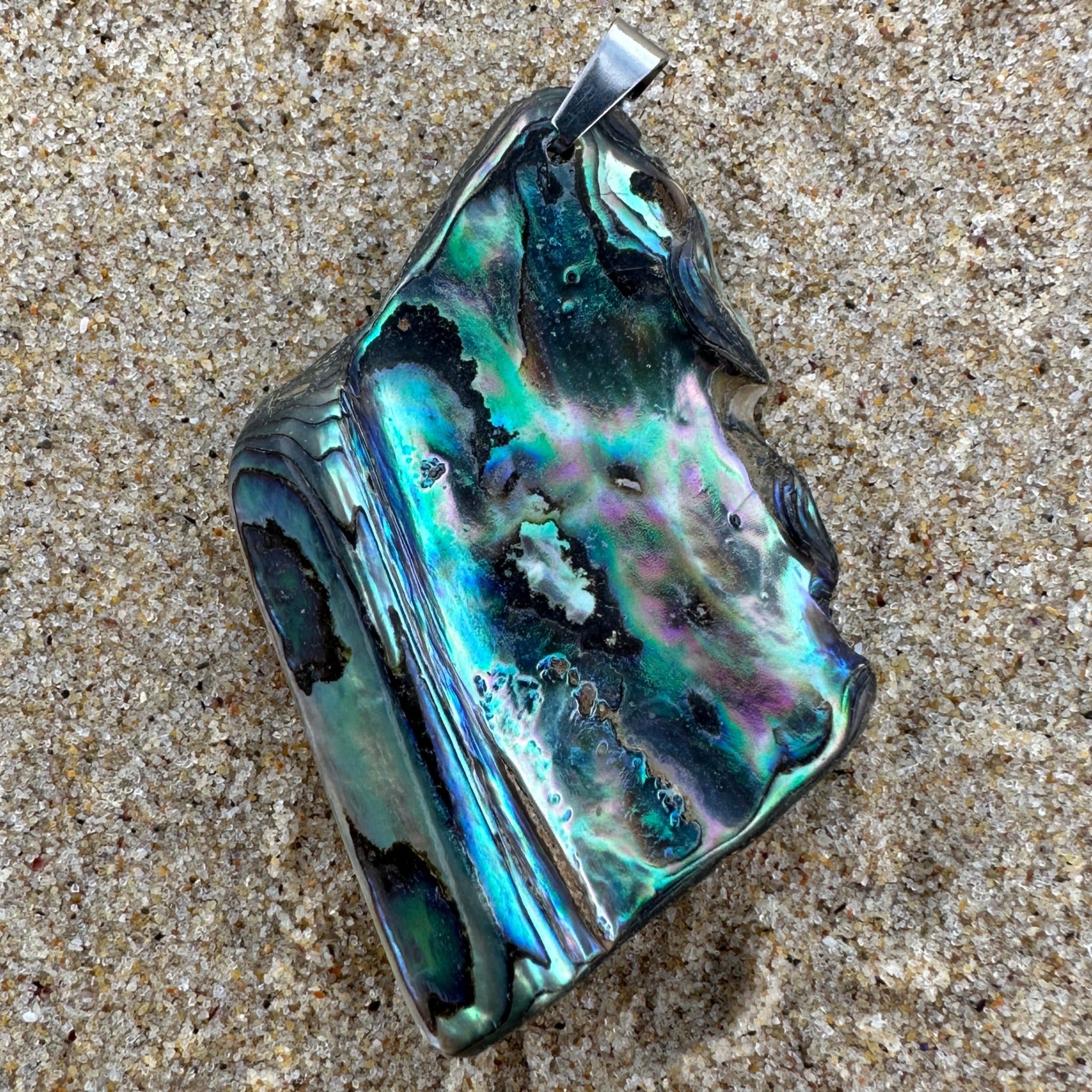 Large Paua Shell Pendant with iridescent natural colours, paired with a complimentary stainless steel chain. 10177_LGE