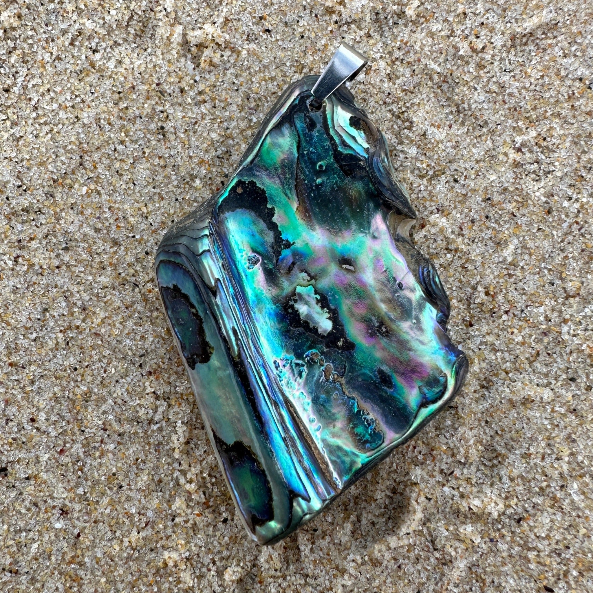 Large Paua Shell Pendant with iridescent natural colours, paired with a complimentary stainless steel chain. 10177_LGE